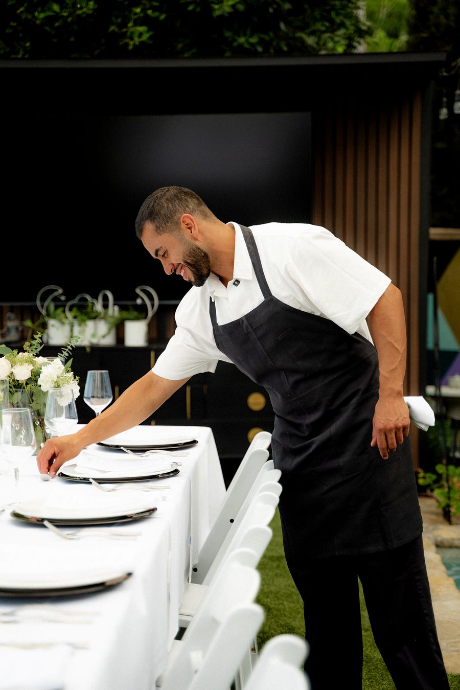 Edgar setting the table before dinner