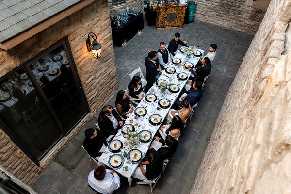 A team dinner along a courtyard table