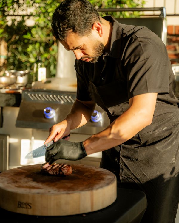 Edgar carving at the board