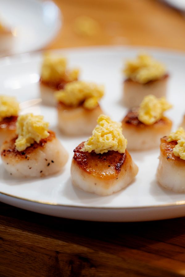 Seared scallops, plated